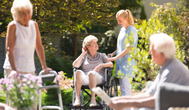 woman in wheelchair spending time outside